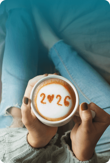 A woman enjoys a cup of coffee in 2026